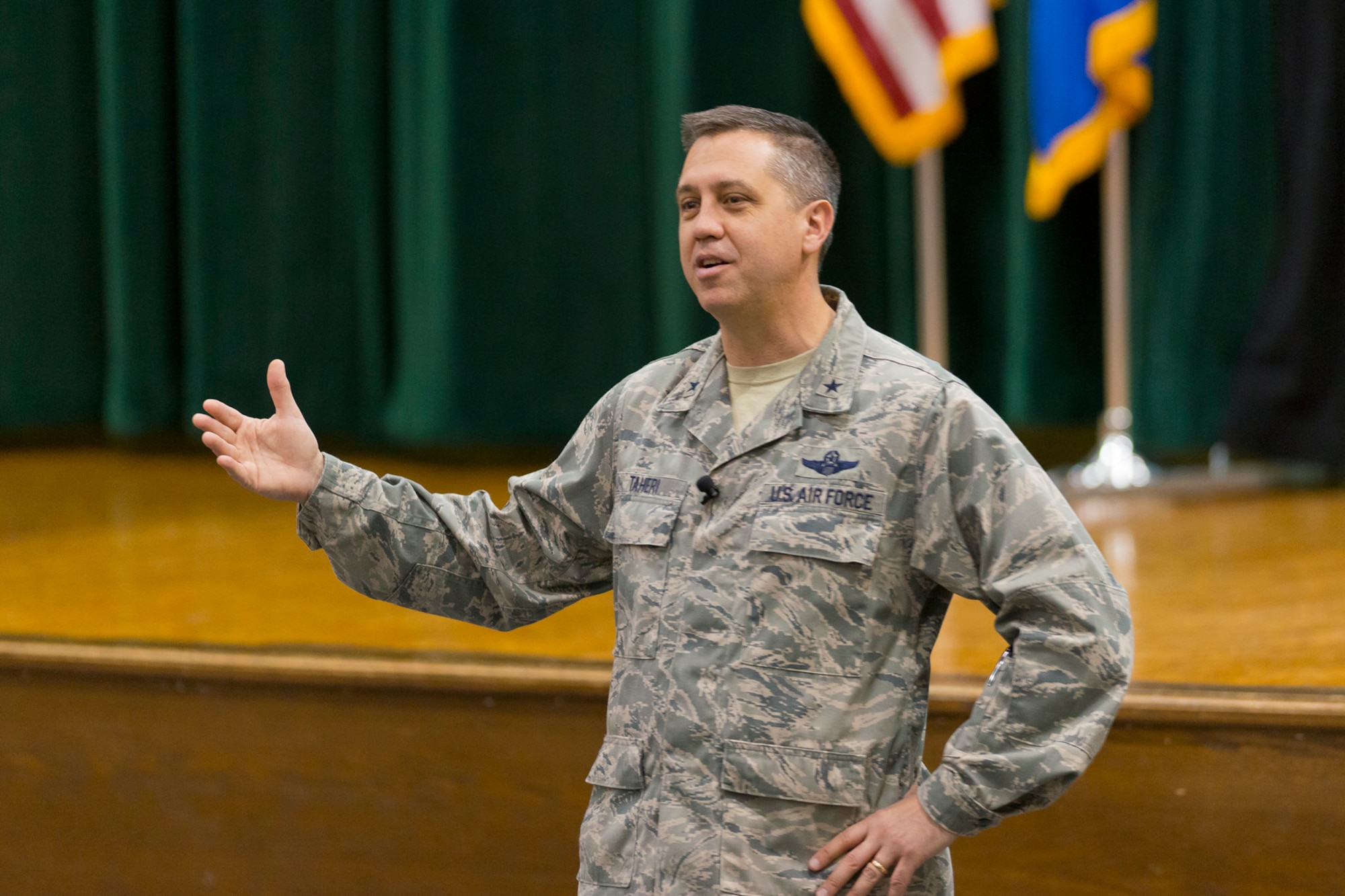Brig. Gen. Michael R. Taheri, commander of the Air National Guard Readiness Center addresses Airmen at the base theater at Joint Base Andrews, Md., April 9, 2015. Airmen gathered to discuss awareness, prevention and ways to care for victims of sexual assault. (Air National Guard photo by Master Sgt. Marvin R. Preston/RELEASED)