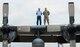 Retired U.S. Air Force Senior Master Sgt. Lawrence Herter, left, and Staff Sgt. Kenzi Klingenberg, 723d Aircraft Maintenance Squadron crew chief, pose for a photo on the wing of an HC-130P Combat King April 15, 2015, at Moody Air Force Base, Ga. Herter was a crew chief on the aircraft from 1989 to 1991 and Klingenberg is the aircraft’s current crew chief. (U.S. Air Force photo by Airman 1st Class Ceaira Tinsley/Released)
