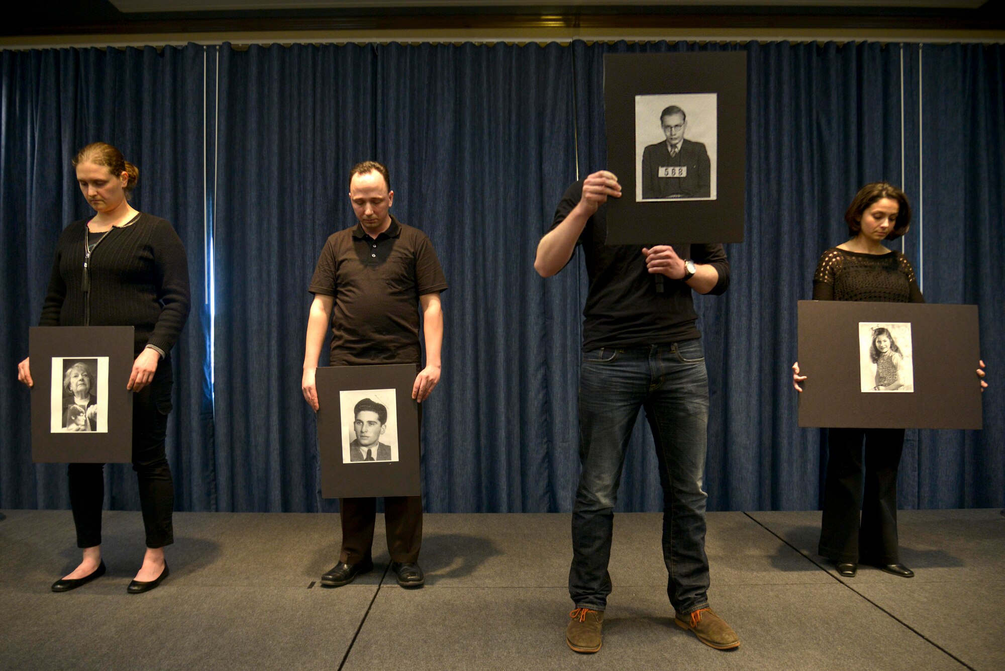 Members of the Toastmasters Club share the first person experiences of several Holocaust survivors during the Holocaust Remembrance Day event April 16, 2015, at Fairchild Air Force Base, Wash. Fairchild Airmen gathered to remember how the Jews suffered during the war and recognized their accomplishments since the war. (U.S. Air Force photo/Senior Airman Janelle Patiño) 