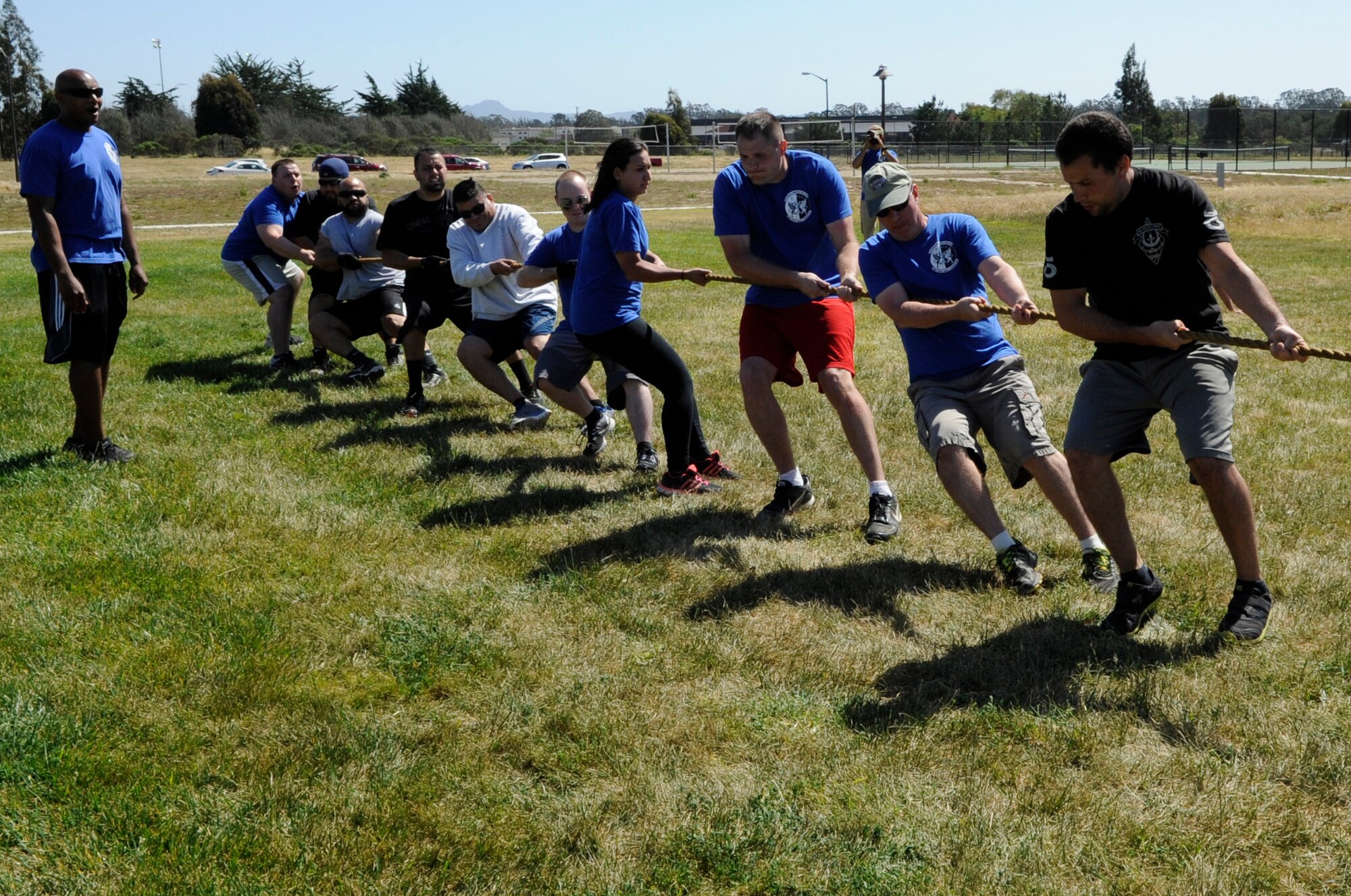 Members of the 30th Space Communications Squadron play tug-of-war with members of the 614th Air and Space Communications Squadron during a cyber sports challenge, April 17, 2015, Vandenberg Air Force Base, Calif. The event aimed to build camaraderie while pitting the base’s two communications squadrons, the 614th Air and Space Communications Squadron and the 30th Space Communications Squadron, against each other in a series of friendly, yet competitive, physical competitions. (U.S. Air Force photo by Senior Airman Shane Phipps/Released)
