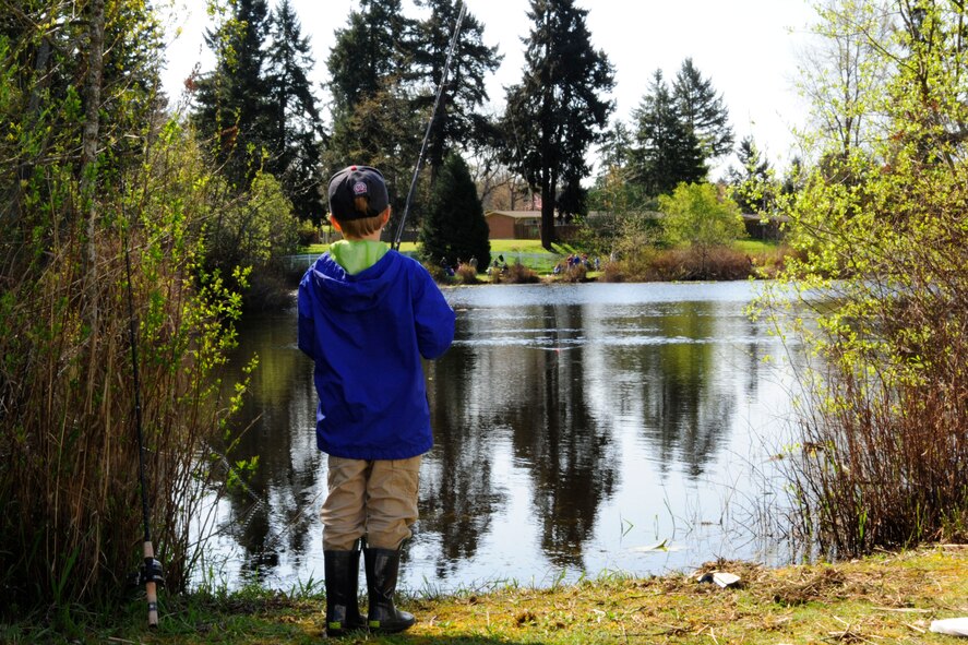 One of 190 children who participated in the Top III Annual Children’s Fishing Derby casts his line, April 18, 2015, at Joint Base Lewis-McChord, Wash. The derby, which has been held for more than a decade, offers children aged one to 14 years old, split into four age groups, the opportunity to learn how to fish and display their skills in the spirit of friendly competition. (U.S. Air Force photo/Senior Airman Rebecca Blossom)