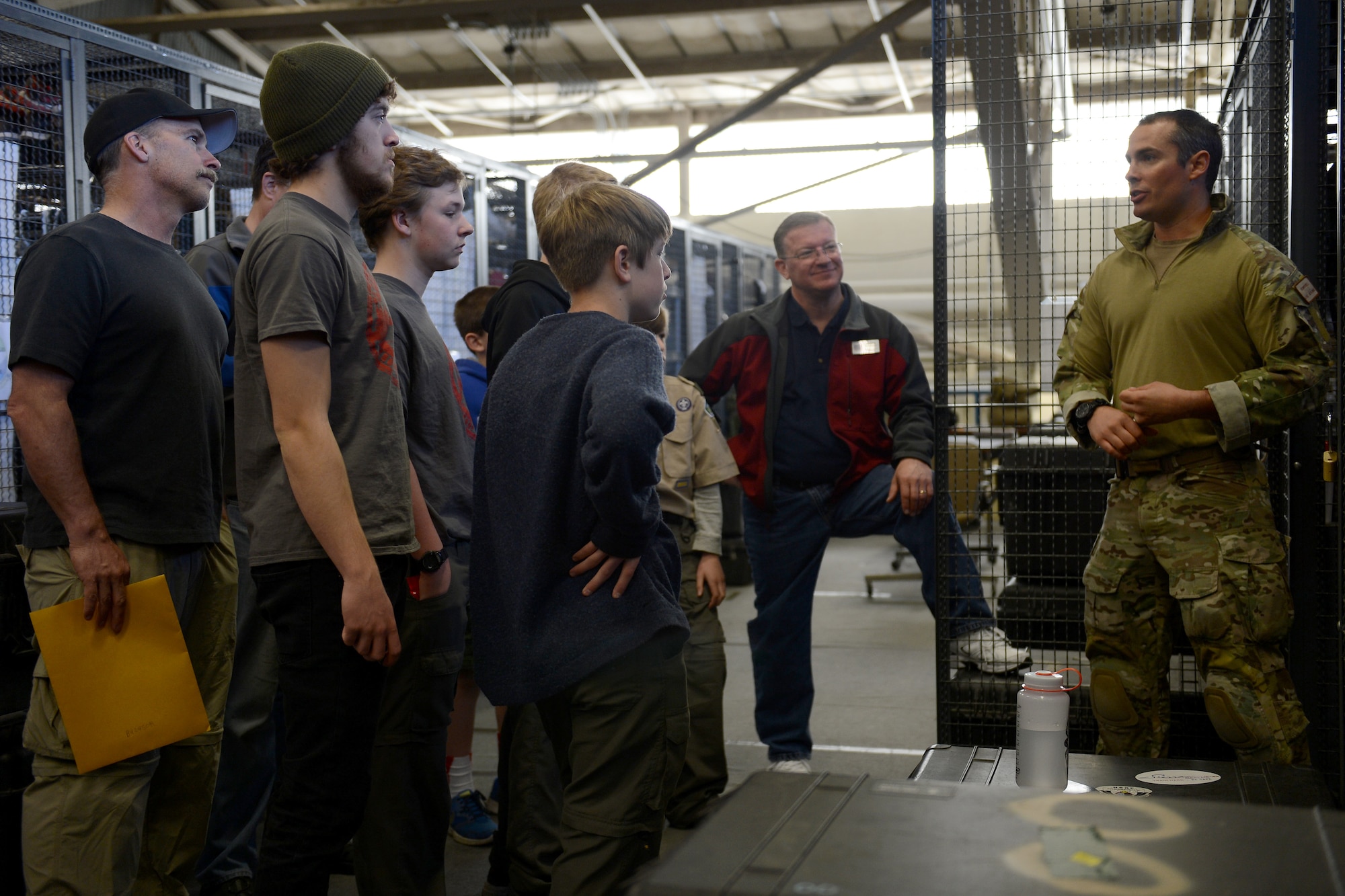 Tech. Sgt. Dean Criswell, 22nd Special Tactics Squadron pararescueman, gives Boy Scouts from Troop 007 a tour, April 18, 2015, at Joint Base Lewis-McChord, Wash. The boy scouts visited McChord Field to earn their climbing merit badges. (U.S. Air Force photo/Airman 1st Class Keoni Chavarria)