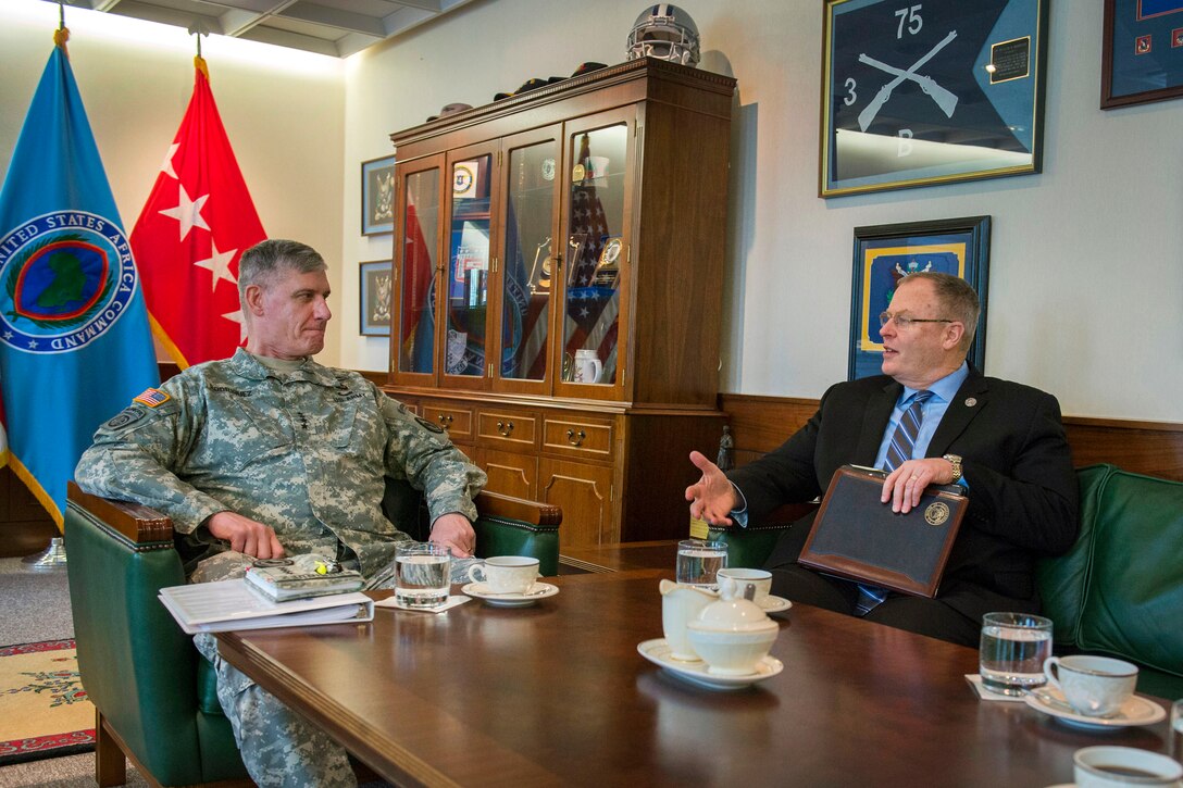 U.S. Deputy Defense Secretary Bob Work, right, meets with U.S. Army Gen. David Rodriguez, commander of U.S. Africa Command, during a visit to Kelley Barracks, Germany, April 17, 2015.
