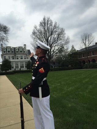 Lance Cpl. Noel Mayorqa of First Platoon “Ready First”, Alpha Company talks about the Home of the Commandants during crowd education training at Marine Barracks Washington, D.C. Crowd educators are Marines from across the installation who volunteer to speak with Friday Evening Parade guests before the parade. Mayorqa wanted to make a difference in his platoon and share the knowledge he learned from the crowd education program with his peers and leadership. 