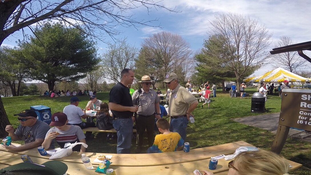 USACE Philadelphia District Commander Lt. Col. Michael Bliss (left) speaks with John Cave, Blue Marsh Lake Natural Resource Manager (center) and retired manager Al Schoenbeck during Take Pride in Blue Marsh Day in April 2015.   