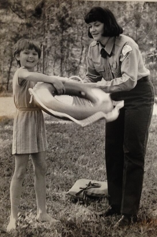 Dianne Edwardson teaching water safety in 1985 in the campground at Little Rock District.