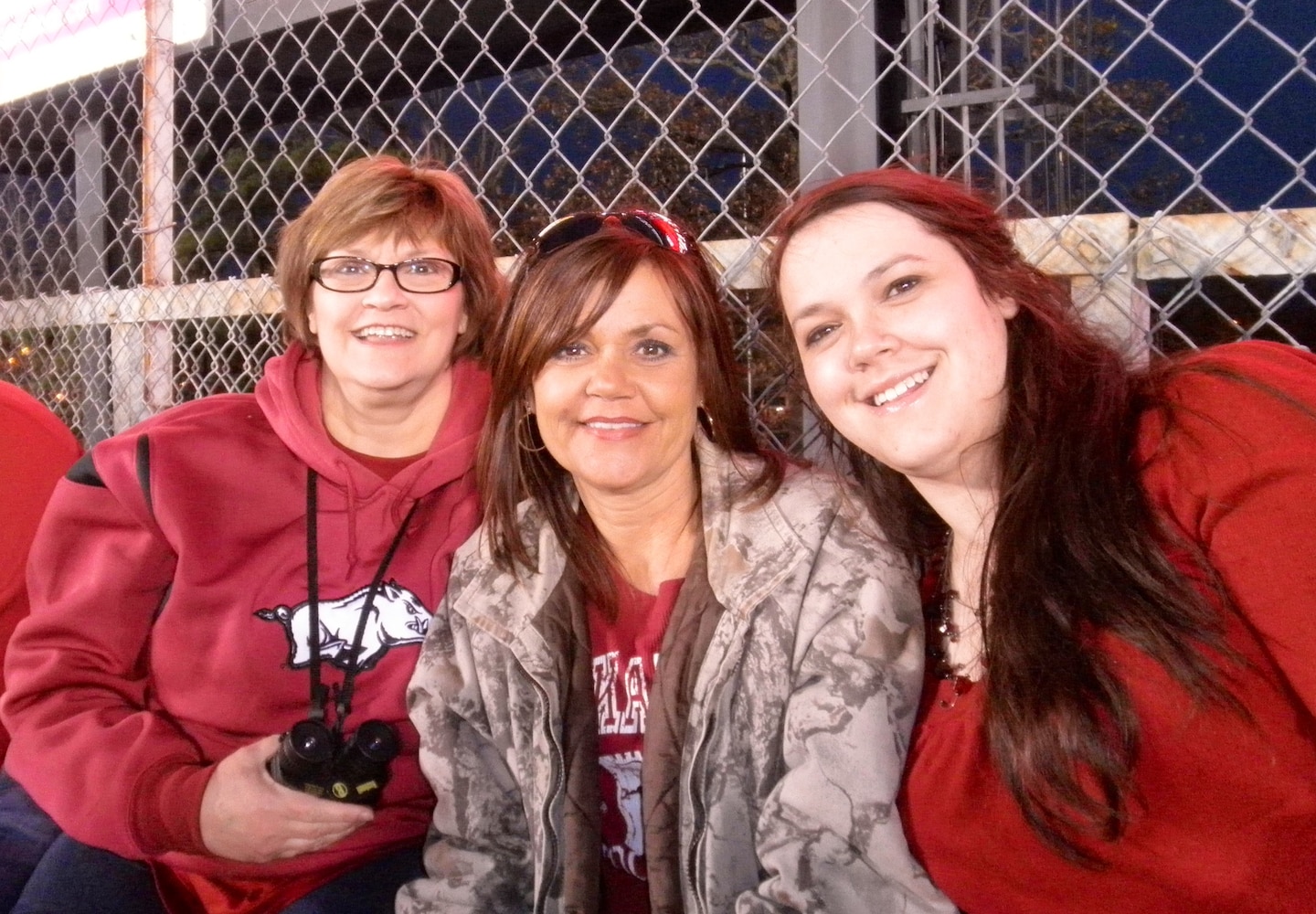 Dianne Edwardson, the new USACE Baltimore Chief of Operations shares her passion for  the University of Arkansas Razorbacks pictured with her daughter (Elyse) and sister (Glenda).