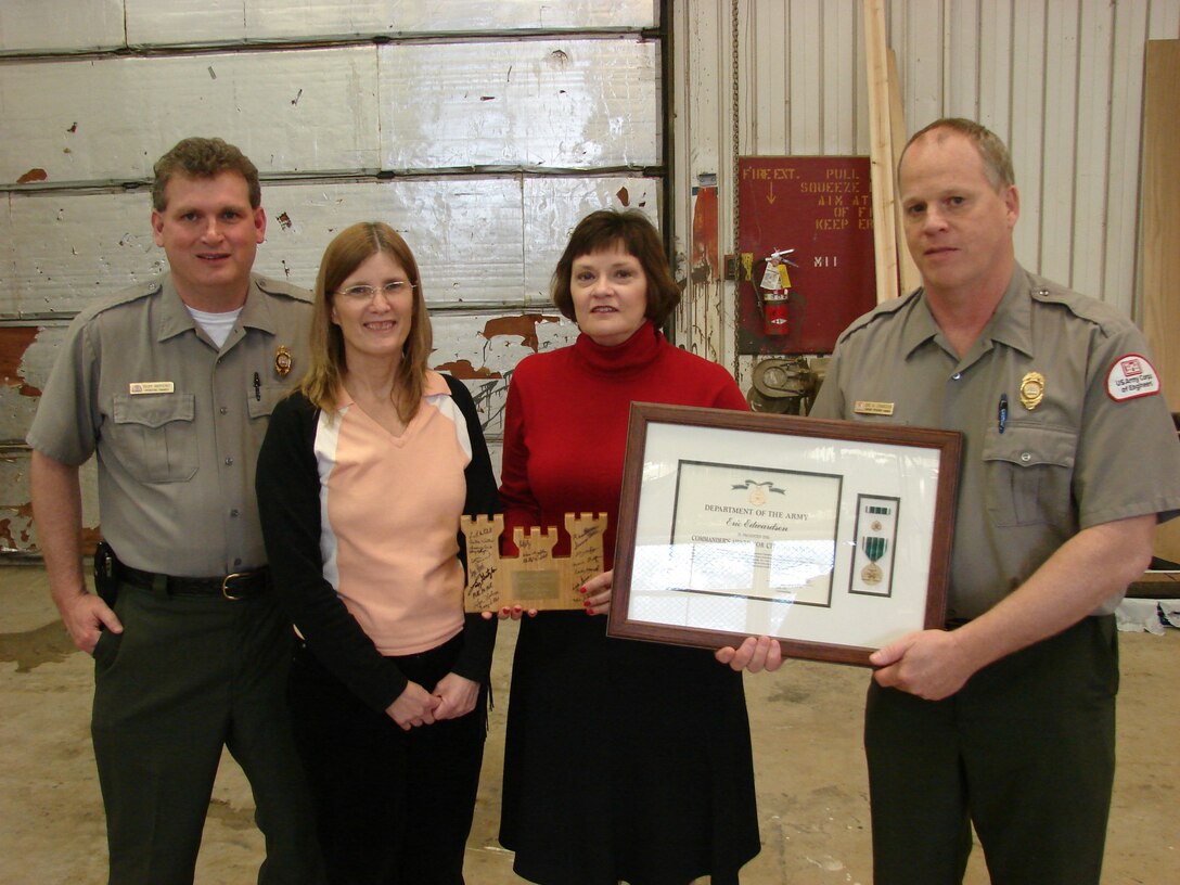 Dianne Edwardson, Baltimore District's new chief of operations, stands alongside her husband and fellow USACE employee Eric Edwardson receiving recognition as Assistant OPM at Lake Shelbyville in 2008 as a part of St. Louis District with Ricky Raymond (OPM) and Peg O'Brien, chief of operations.