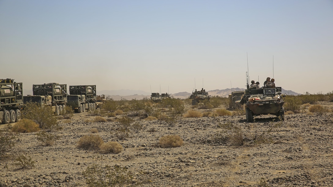 Marines with 3rd Light Armored Reconnaissance Battalion traverse the desert on the way to set up a forward combat operations center during Exercise Desert Scimitar, April 12, 2015, aboard the Combat Center. Division-level exercises, such as Desert Scimitar, allow division units to train in order to maintain mission readiness. 