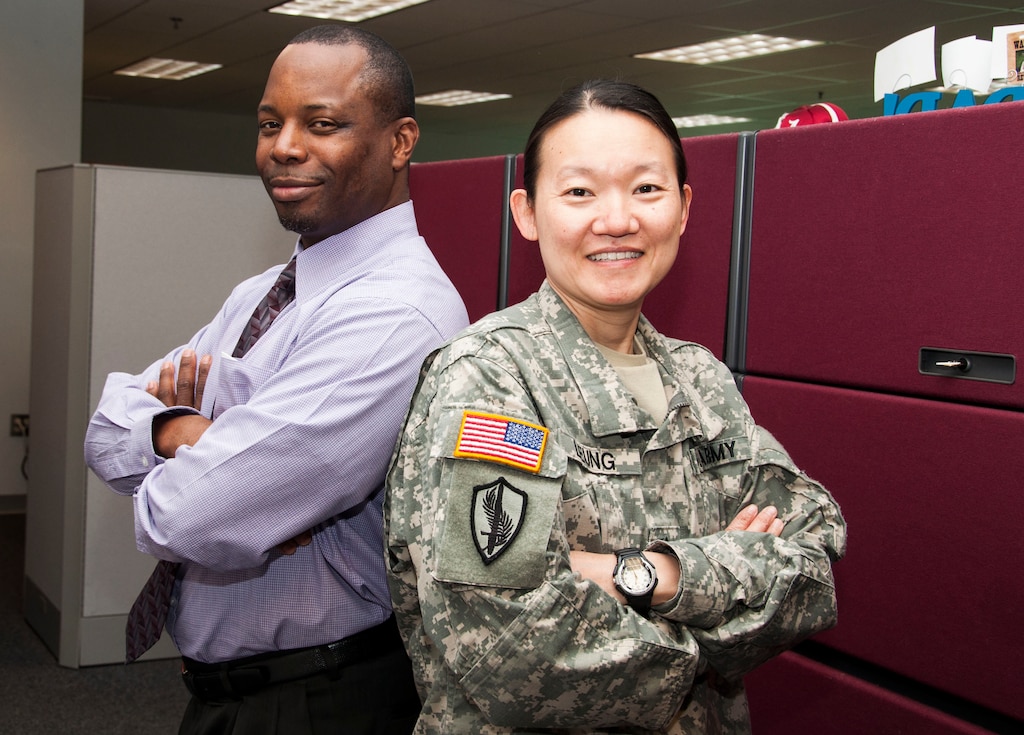 With only a handful of uniformed personnel working side by side with civilians, the work environment at the U.S. Army Corps of Engineers, Middle East District, is quite different from what Soldiers would encounter at their average duty station. 
Though Soldiers come to work in uniform each 