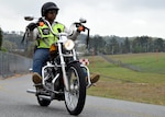 Brigade commander, motorcycle rider and rider coach Col. Reginald Neal on the road following a basic rider's course refresher at Dobbins Air Reserve Base in Marietta, Georgia. "No matter how busy you are, you have time for safety," said Col. Neal during the training.