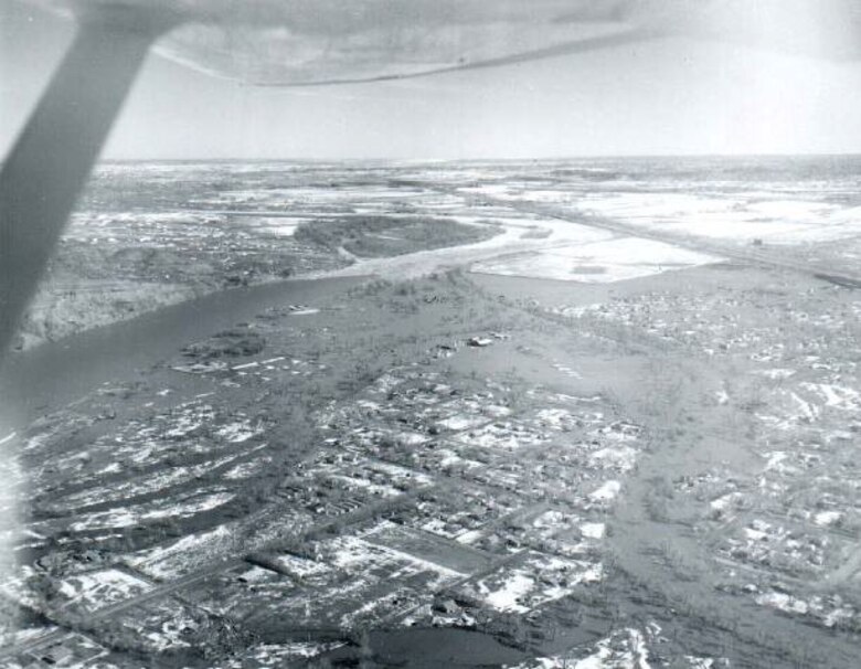 Miles City is located at the confluence of the Tongue and Yellowstone Rivers in eastern Montana. Here we have a photo of the 1968 ice jam flood.