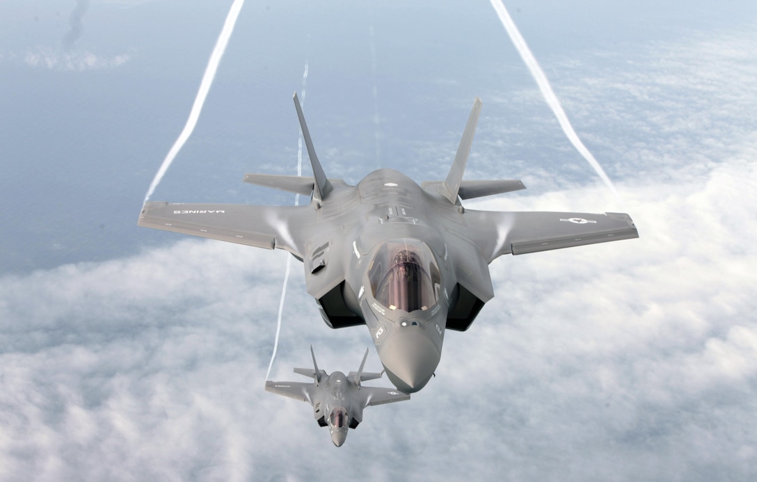 Naval aviators with Marine Fighter Attack Training Squadron 501 fly above Eastern North Carolina inside of F-35B Lightning II Joint Strike Fighters during training with Marine Aerial Refueler Transport Squadron 252, April 14, 2015. VMFAT-501 is the Corps’ only active training squadron for the F-35B, which provides a multi-role, fifth-generation fighter attack capability for the Marine Air-Ground Task Force. VMFAT-501 is based at Marine Corps Air Station Beaufort, S.C., and VMGR-252 is based at MCAS Cherry Point.