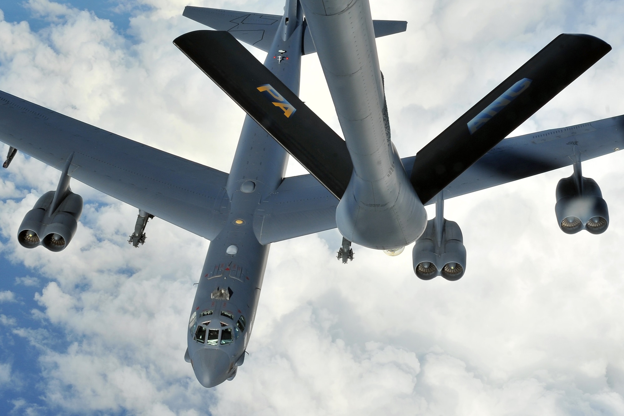 A 20th Expeditionary Bomb Squadron B-52 Stratofortress aircrew detaches from a KC-135 Stratotanker, from the Pittsburgh International Airport Air Reserve Station, Pa., after refueling in the Asia-Pacific region April 16, 2015. The B-52 crews are deployed from Barksdale Air Force Base, La., to Andersen AFB, Guam, in support of U.S. Pacific Command’s Continuous Bomber Presence to strengthen regional security and stability. (U.S. Air Force photo by Staff Sgt. Melissa B. White/Released)