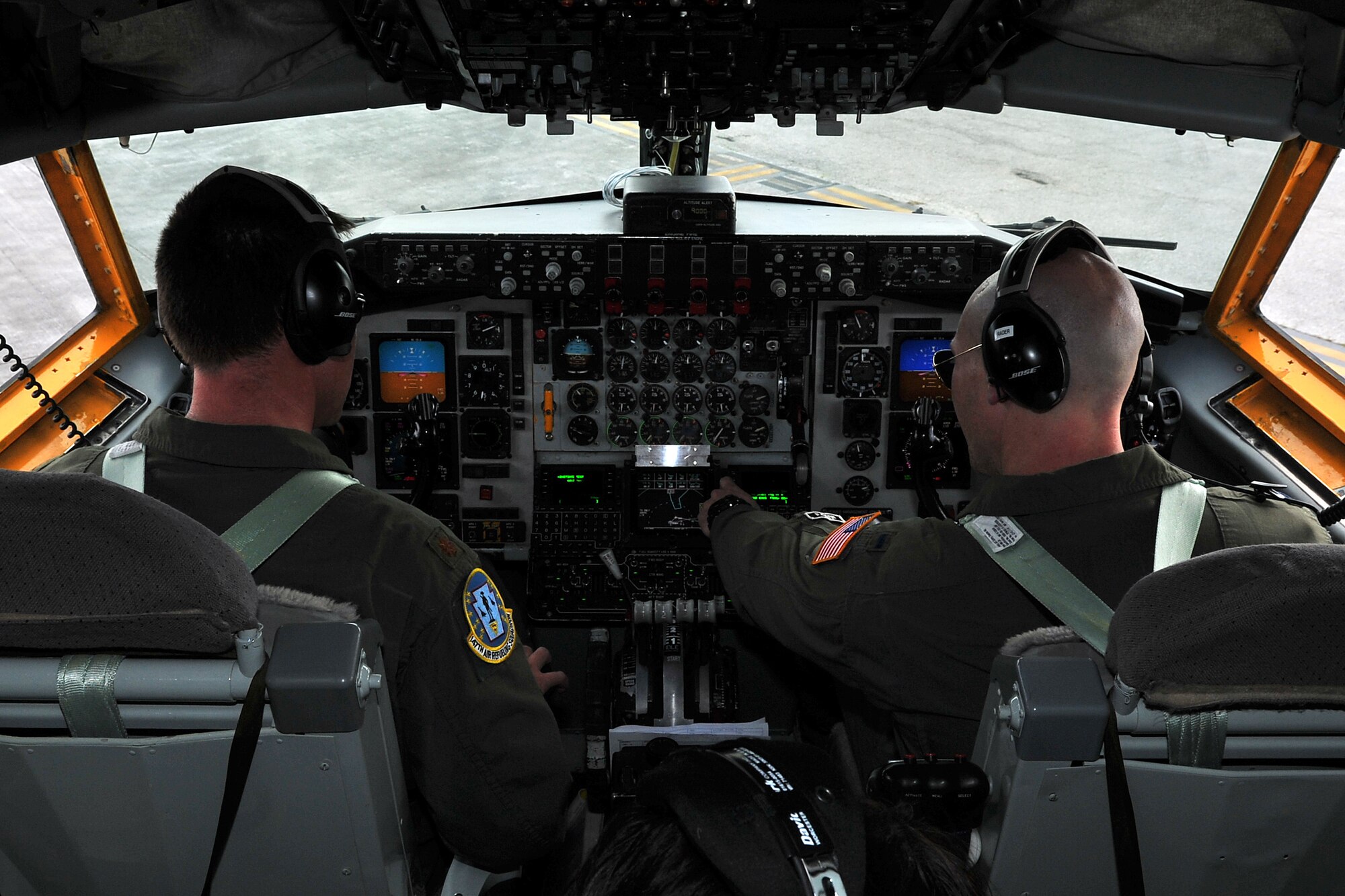 Maj. Scott Fisher, 506th Expeditionary Aerial Refueling Squadron pilot, and 1st Lt. Brandon Rader, 506th EARS co-pilot, implement a preflight checklist prior to departing Andersen Air Force Base, Guam, April 16, 2015, on a KC-135 Stratotanker aerial refueling mission. The tankers routinely support B-52 Stratofortress aircrews with refueling in support of U.S. Pacific Command’s Continuous Bomber Presence in the Asia-Pacific region. Fisher and Rader are deployed to Andersen Air Force Base from the Pittsburgh International Airport Air Reserve Station, Pa. (U.S. Air Force photo by Staff Sgt. Melissa B. White/Released)