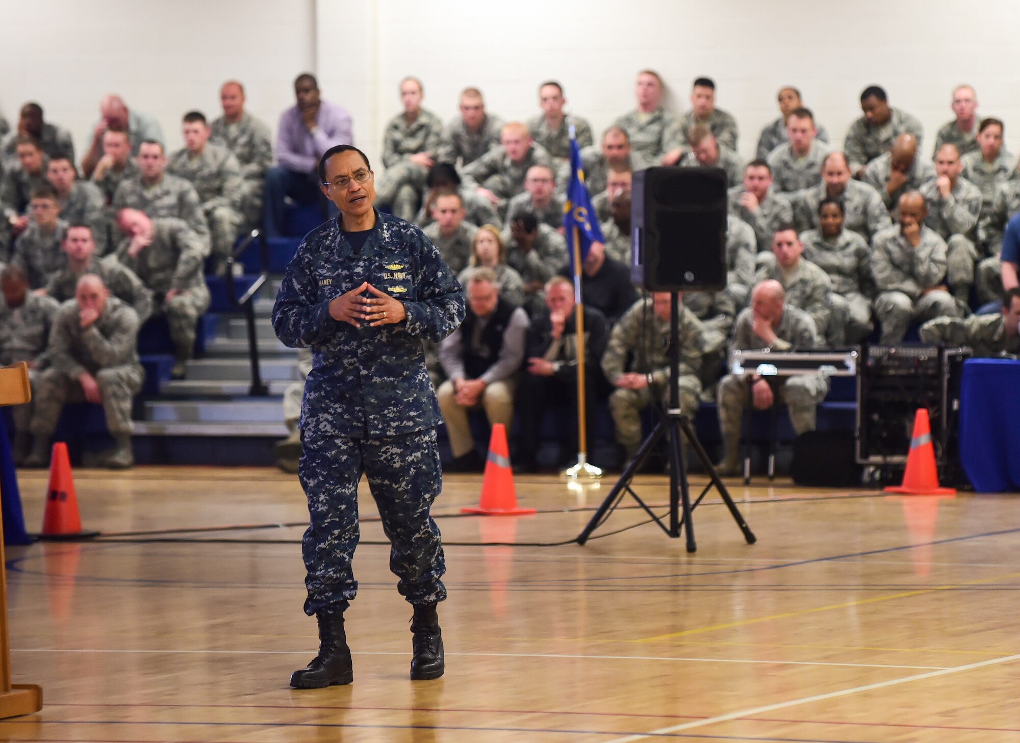 U.S. Navy Adm. Cecil D. Haney, U.S. Strategic Command commander, discusses how to overcome current and future strategic challenges during an all-hands call at Buckley Air Force Base, Colo., April 20, 2015. During his visit, Haney toured Buckley’s missile warning facilities and met with Airmen and Sailors from the base to discuss their role in supporting USSTRATCOM’s global strategic missions. USSTRATCOM is one of nine DoD unified combatant commands and is charged with strategic deterrence; space operations; cyberspace operations; joint electronic warfare; global strike; missile defense; intelligence, surveillance and reconnaissance; combating weapons of mass destruction; and analysis and targeting. (U.S. Air Force photo by Amn. 1st Class Luke W. Nowakowski)
