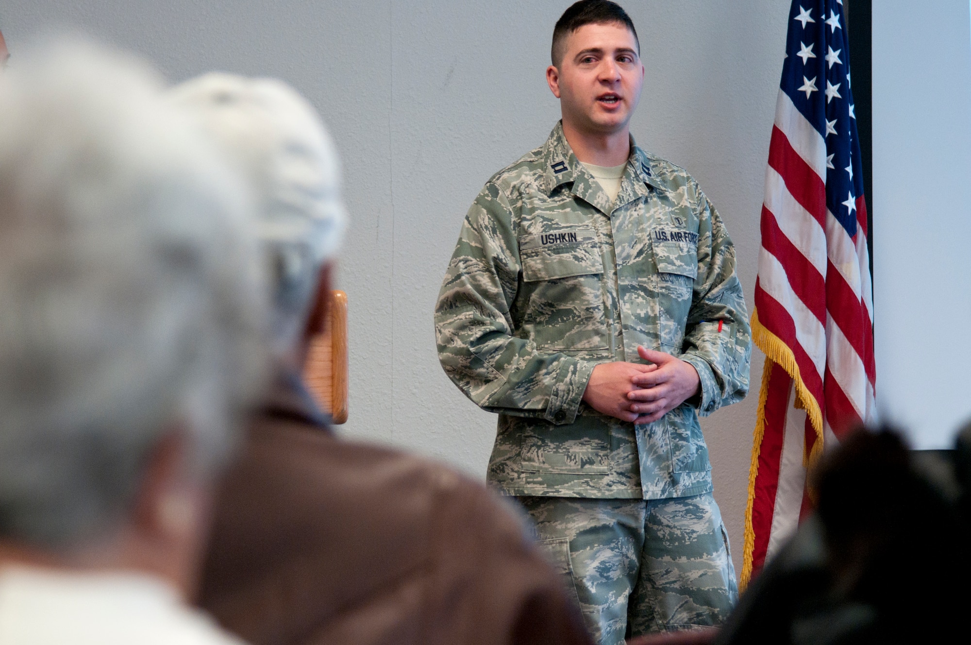 Capt. Aleksey Ushkin, 90th Medical Support Squadron pharmacist, explains the support provided by the Medical Treatment Facility pharmacy to retirees during a Retiree Appreciation Day event April 18, 2015, on F.E. Warren Air Force Base, Wyo. Retirees were provided the opportunity to ask any questions they had about the clinic (U.S. Air Force photo by Airman 1st Class Malcolm Mayfield)
