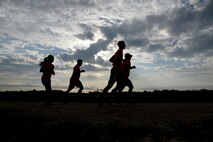Competitors, at the 11th annual Adventure Race, run on the track at Laughlin Air Force Base, Texas, April 18, 2015. This year’s winning team, the Red Bulls, finished the race in two hours, four minutes and 15 seconds. (U.S. Air Force photo by Airman 1st Class Ariel D. Partlow)