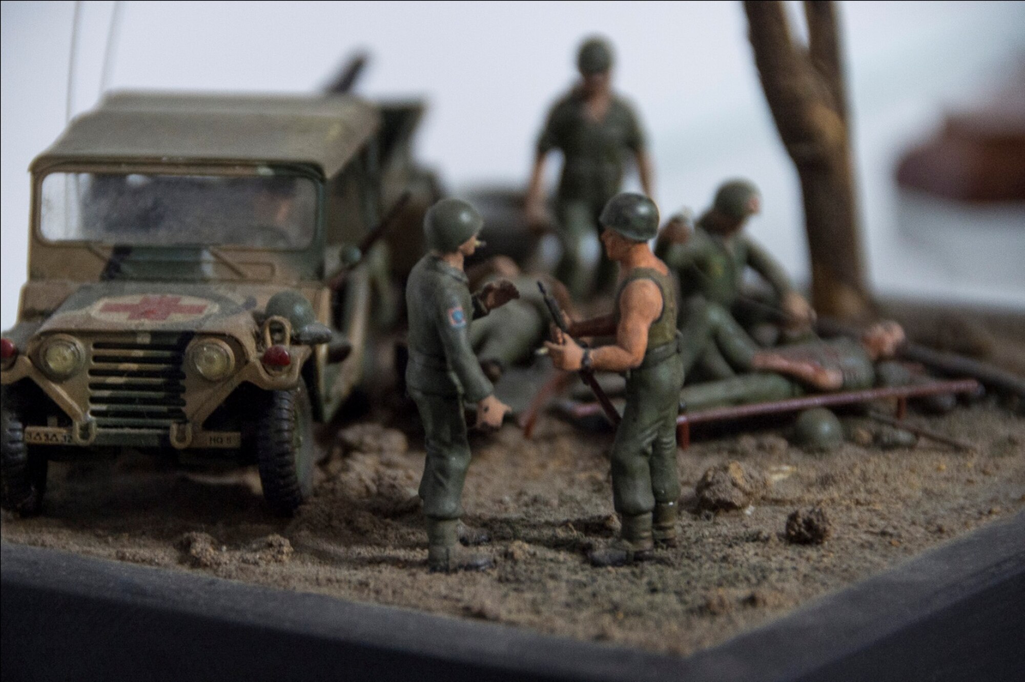 A group of action figures on display in a Brazilian air force break room depicts early transportation of patients. Members from the United States Air Force are training with Brazilian air force counterparts and sharing best practices during a week-long Expeditionary Medical Support training session, April 20, 2015, in Rio de Janeiro, Brazil. (U.S. Air Force photo by Staff Sgt. Adam Grant/Released)