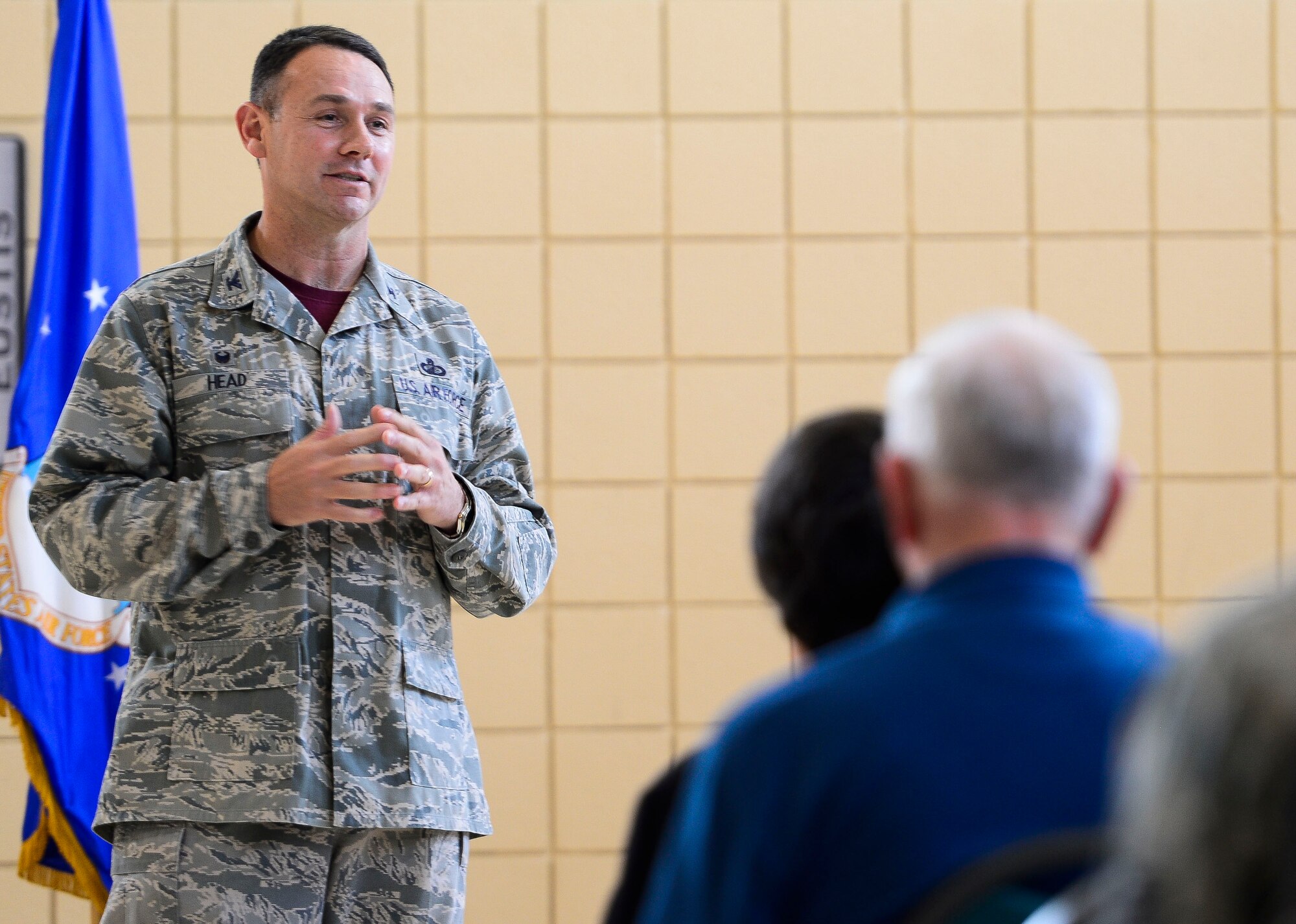 U.S. Air Force Col. Kevin Head, 633rd Mission Support Group commander, addresses a crowd during the 2015 JBLE Volunteer Salute at Langley Air Force Base, Va., April 17, 2015. U.S. Service members and civilians were awarded outstanding volunteer and volunteer excellence awards during the event. (U.S. Air Force photo by Senior Airman Kayla Newman/Released)