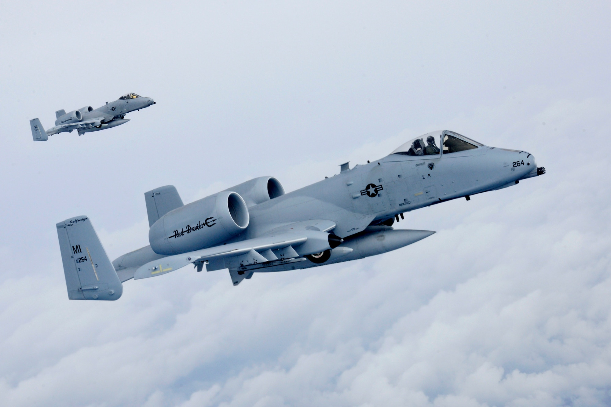 150411-Z-EZ686-183 -- A-10 Thunderbolt II aircraft from Selfridge Air National Guard Base seen in flight while deploying to Southwest Asia earlier in April. The aircraft are flown by the 107th Fighter Squadron at Selfridge. (U.S. Air National Guard photo by Master Sgt. David Kujawa)

