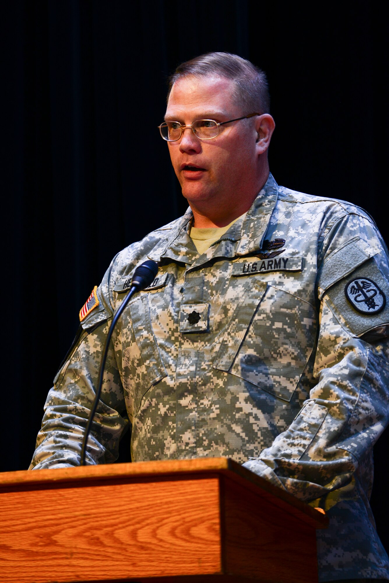U.S. Army Lt. Col. Robert Herrold, McDonald Army Health Center acting commander, speaks during the Holocaust Remembrance Ceremony at Fort Eustis, Va., April 17, 2015. Herrold encouraged the audience to continue to remember and learn about Holocaust tragedies that happened years ago. (U.S. Air Force photo by Senior Airman Kimberly Nagle/Released)