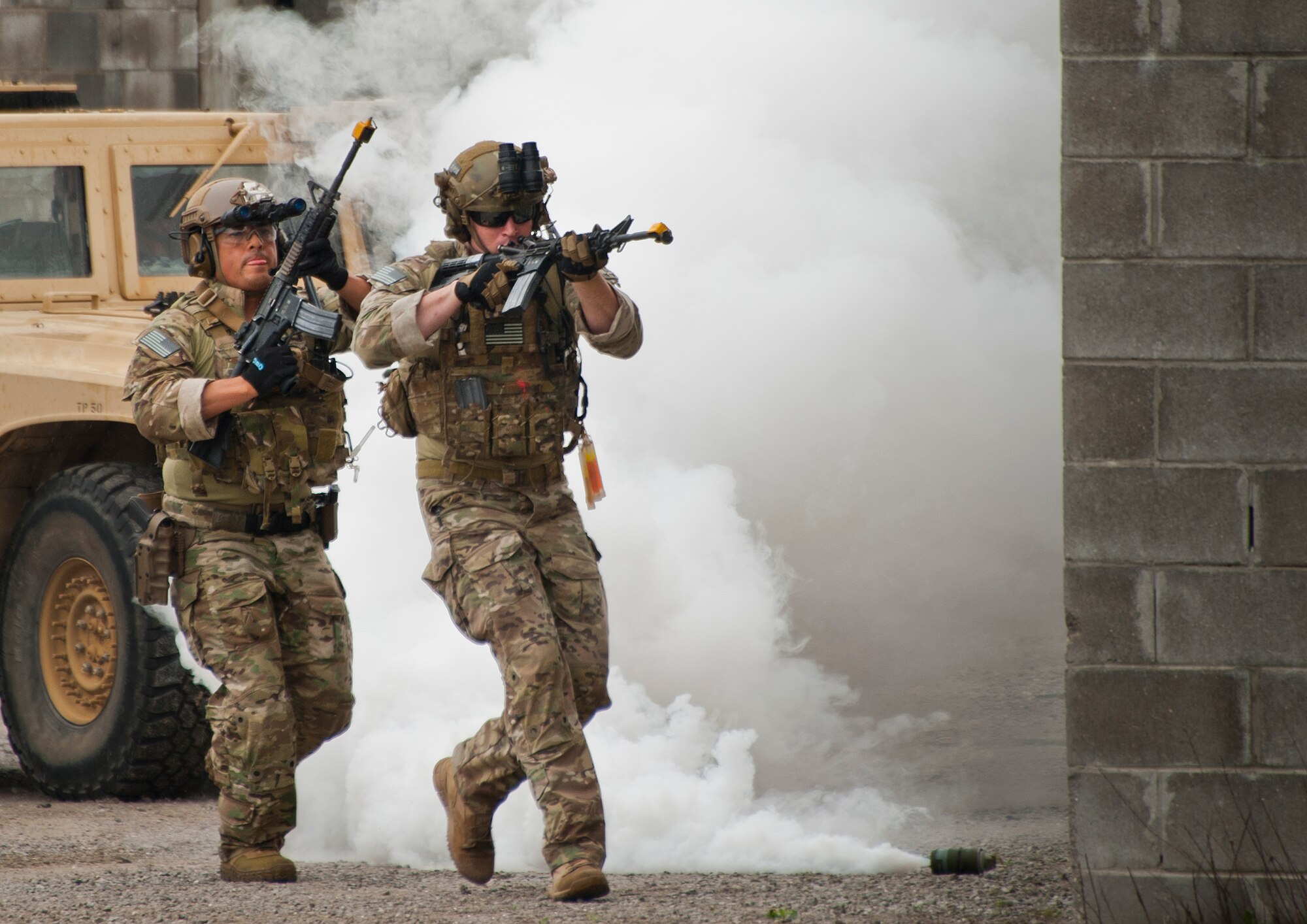 Soldiers from the 7th Special Forces Group put on a ground demonstration during Operation Hero April 18 at Eglin Air Force Base, Fla. More than 275 kids participated in this year’s event which is a mock deployment experience created to give military children a glimpse of what their loved ones go through when they leave home. The kids went through a deployment line to get their dog tags and “immunizations” before they were briefed by the commander and shipped off to a deployed location. There, they participated in various activities and demonstrations put on by local base agencies. (U.S. Air Force photo/Sara Vidoni)