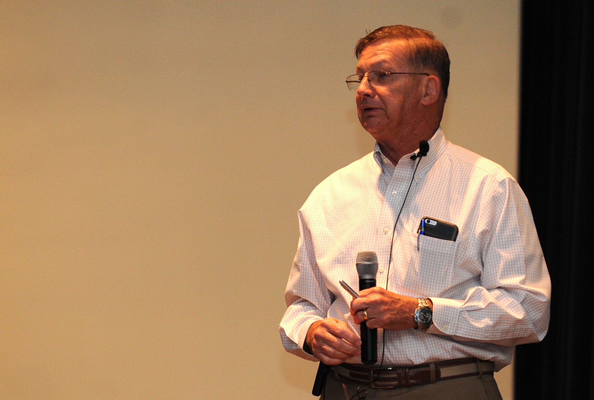 Retired Col. Charles “Chuck” DeBellevue, a Vietnam War ace, speaks to an audience during a Leadership Lecture Series event, April 16, 2015, at Seymour Johnson Air Force Base, North Carolina. DeBellevue was the highest-scoring ace of the Vietnam War and the first person to become an ace as a weapons systems officer. (U.S. Air Force photo/Senior Airman Ashley J. Thum)