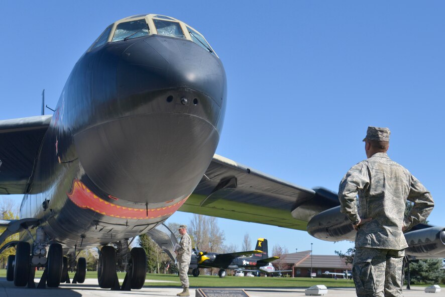 A student from the Central Washington University Air Force ROTC looks at the B-52 Stratofortress static display in Fairchild’s Heritage Air Park during a base wide tour April 17, 2015, at Fairchild Air Force Base, Wash. Students took the time to go around the park to learn more about the different static displays the base has. The park has eight historical aircraft to show and educate Airmen and their families about its history.  (U.S. Air Force photo/Senior Airman Janelle Patiño)