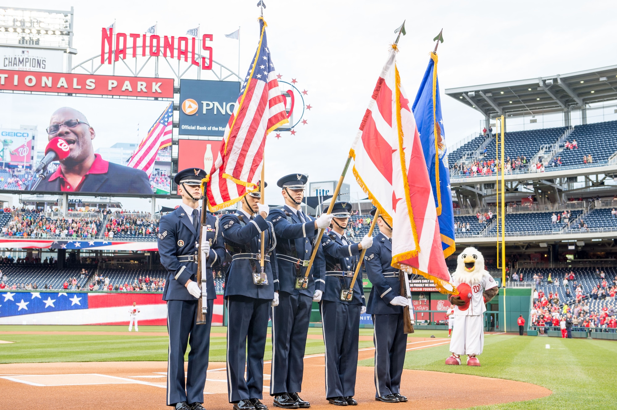 Members of the Air Force Reserve's 459th Air Refueling Wing Honor Guard prepares to present the colors at Nationals Park Stadium before the Washington Nationals vs. Philadelphia Phillies game in Washington, April 17, 2015. The Honor Guard was invited to present celebration of black heritage day and in honor of the Air Force Reserve's 67th birthday. (U.S. Air Force photo by Staff Sgt. Devon Suits)