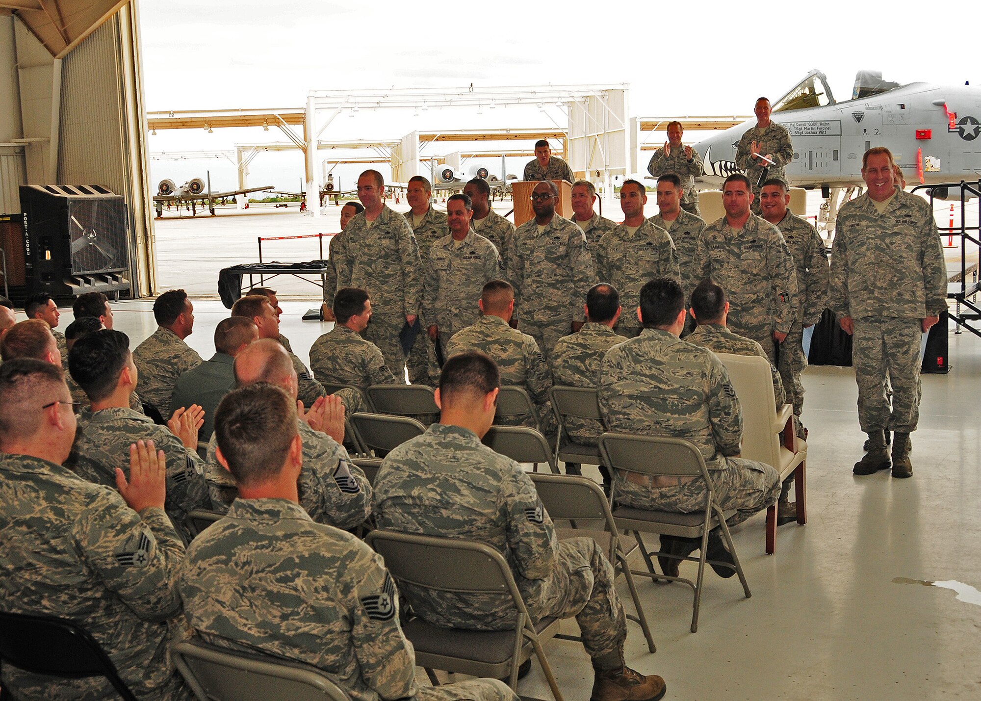 924th Maintenance Squadron crew chiefs, are given applause after being assigned to an A-10 aircraft April 12 during a dedicated crew chief ceremony at Davis Monthan Air Force Base, Ariz. (U.S. Air Force photo taken by Tech. Sgt. Louis Vega Jr.)