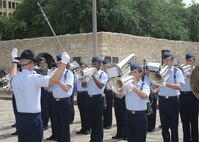 The Joint Base San Antonio-Lackland Drum and Bugle Corps, comprised of Air Force basic military trainees who have been in the Air Force less than seven weeks, perform during Air Force at the Alamo during Fiesta San Antonio April 20. From its beginning in 1891, Fiesta has grown into an annual celebration that includes civic and military observances, street and river float parades, exhibits, sports, music and food representing the spirit, diversity and vitality of San Antonio. (U.S. Air Force photo by Melissa Peterson/released)