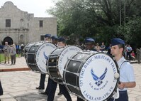 The Joint Base San Antonio-Lackland Drum and Bugle Corps, comprised of Air Force basic military trainees who have been in the Air Force less than seven weeks, perform during Air Force at the Alamo during Fiesta San Antonio April 20. From its beginning in 1891, Fiesta has grown into an annual celebration that includes civic and military observances, street and river float parades, exhibits, sports, music and food representing the spirit, diversity and vitality of San Antonio. (U.S. Air Force photo by Melissa Peterson/released)