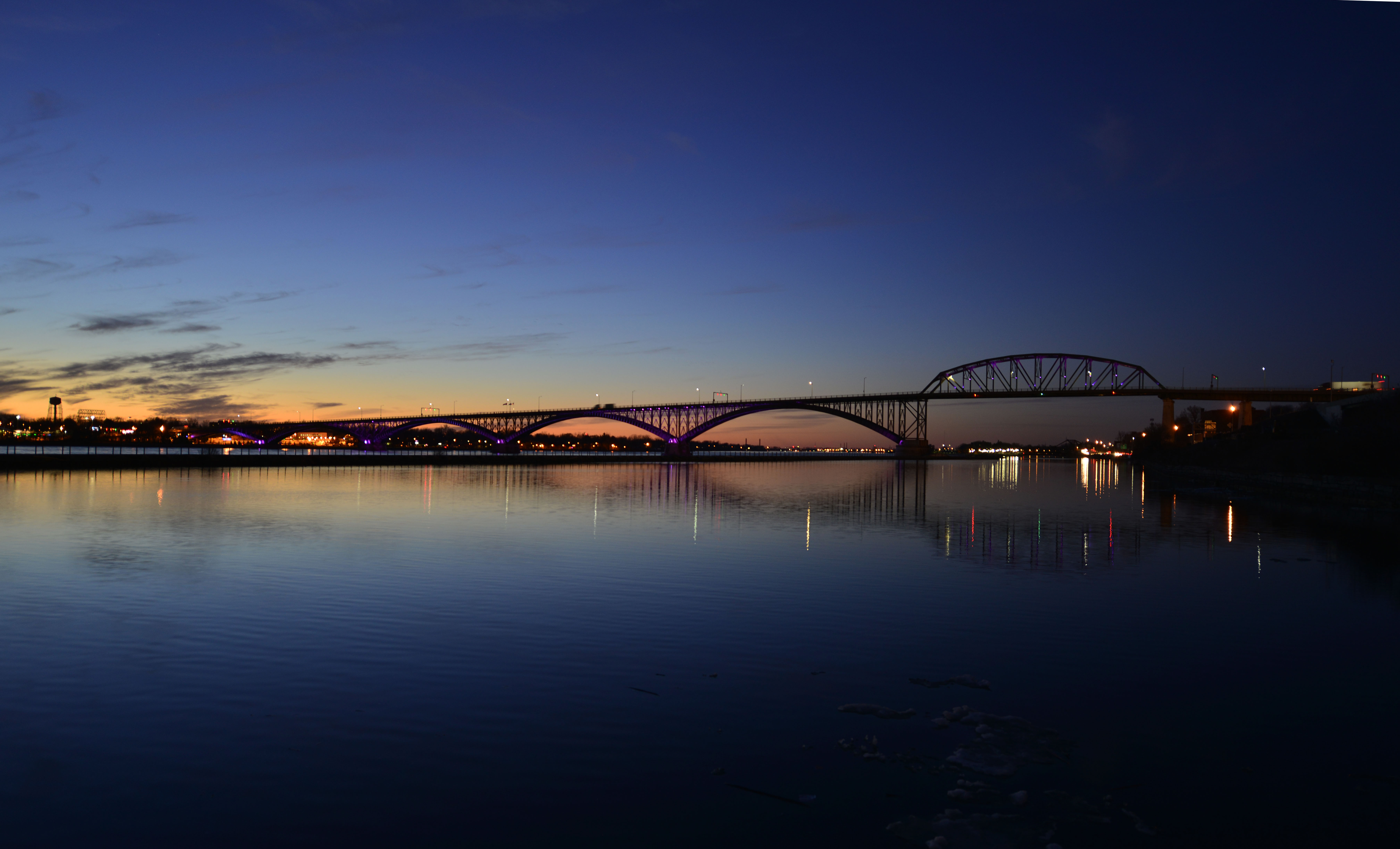 The Peace Bridge, an international bridge between Canada and the United States, displays purple lights as part of the Purple Up! campaign to show support and recognize the sacrifices and strength of military children, April 15, 2015. (U.S. Air Force photo by Tech. Sgt. Stephanie Sawyer)   