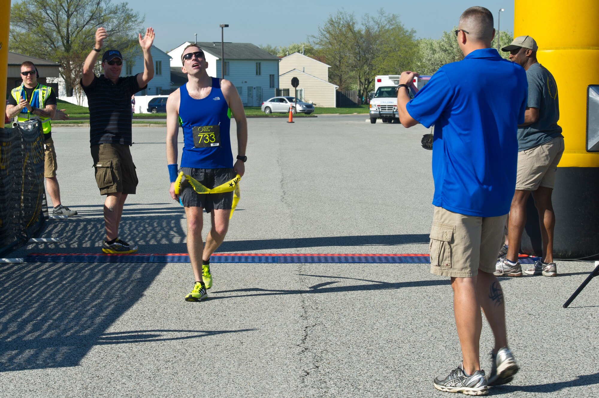 Capt. Philip Blong, 70th Intelligence Surveillance Reconnaissance Wing deputy director of plans and programs, finishes first place at the Joint Base Andrews Half-Marathon, April 18, 2015 at Joint Base Andrews, Maryland. He finished with a time of 1:22:41.  (U.S. Air Force photo/Senior Airman Mariah Haddenham)
