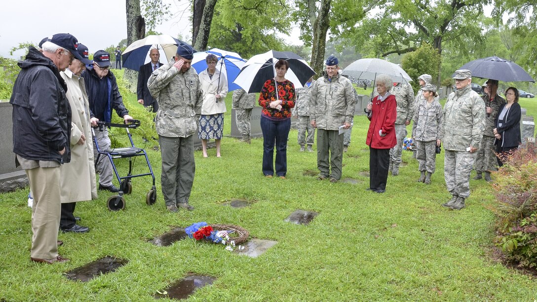 Members from the 117th Air Refueling Wing conduct an annual ceremony at the gravesite of Thomas “Pete” Ray as Lt. Col. Darryl Jett laid a wreath in his honor. Ray and fellow aviator Leo Baker died after the B-26 they were flying was shot down over Cuba during the Bay of Pigs invasion. Ray's body was the only one returned to the United States. (U.S. Air National Guard photo by: Senior Master Sgt. Ken Johnson/Released)