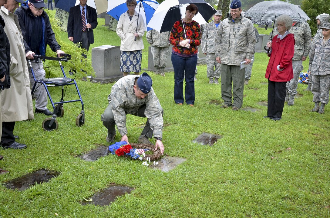 Members from the 117th Air Refueling Wing conduct an annual ceremony at the gravesite of Thomas “Pete” Ray as Lt. Col. Darryl Jett laid a wreath in his honor. Ray and fellow aviator Leo Baker died after the B-26 they were flying was shot down over Cuba during the Bay of Pigs invasion. Ray's body was the only one returned to the United States. (U.S. Air National Guard photo by: Senior Master Sgt. Ken Johnson/Released)