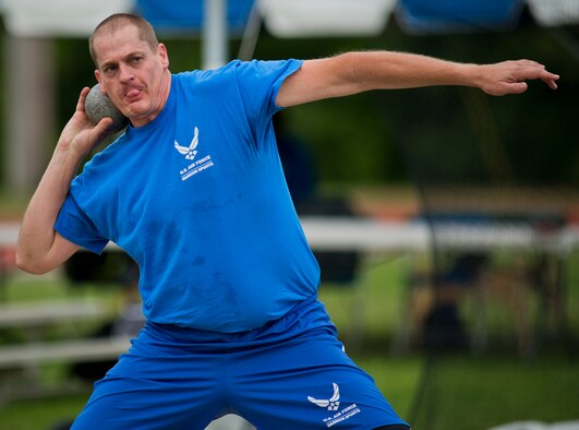 Patrick Young, an Air Force Wounded Warrior athlete, prepares to launch his throw at a shot put practice during the third day of the Warrior Games training camp at Eglin Air Force Base, Fla., April 20. The five-day training camp for the Air Force’s athletes serves as their last practice session before the Warrior Games June 19-28. (U.S. Air Force photo/Samuel King Jr.)