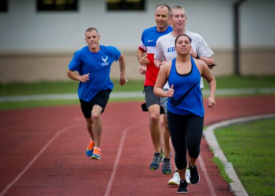 Air Force Wounded Warrior athletes perform a next Airman up running drill during the third day of the Warrior Games training camp at Eglin Air Force Base, Fla., April 20. The five-day training camp for the Air Force’s athletes serves as their last practice session before the Warrior Games June 19-28. (U.S. Air Force photo/Samuel King Jr.)