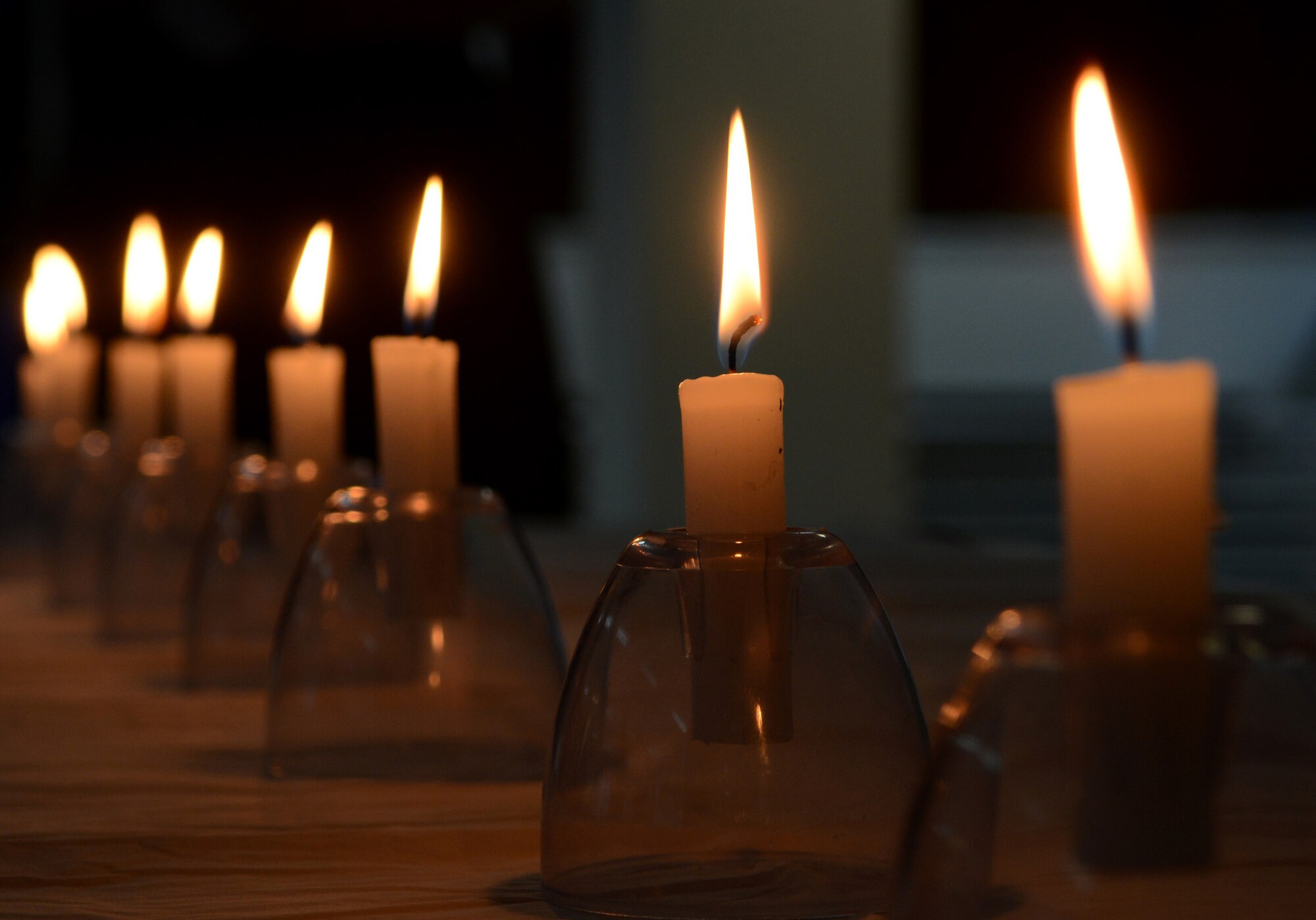 Several candles burn during a Holocaust Remembrance Ceremony April 17, 2015, at Incirlik Air Base, Turkey. The candles are representative and commemorative of the millions of lives lost during the Holocaust. (U.S. Air Force photo by Staff Sgt. Caleb Pierce/Released) 