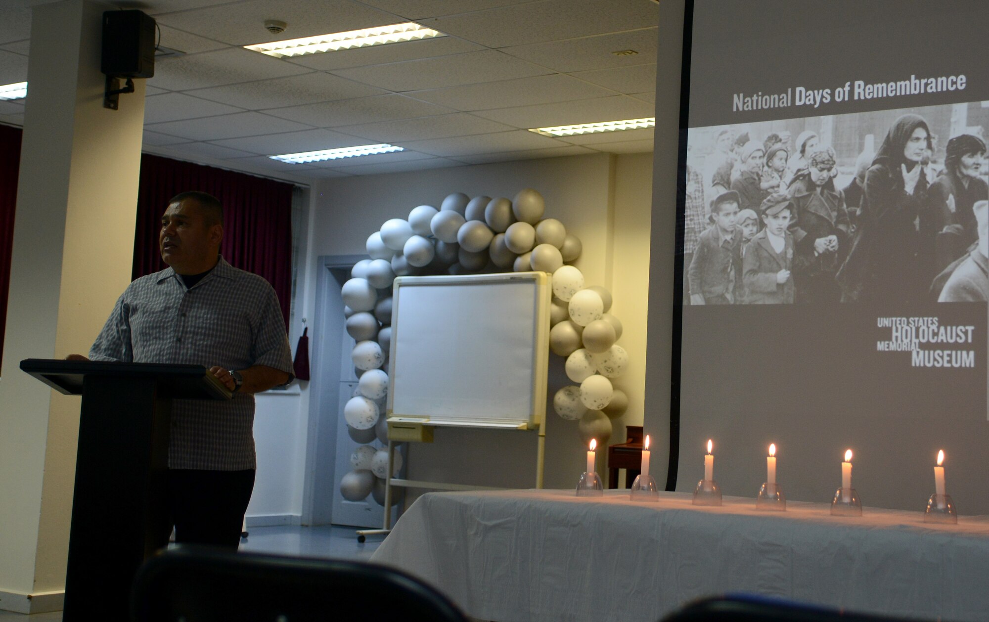 Lt. Col. Paul Castillo, 39th Air Base Wing chaplain, speaks during a Holocaust Remembrance Ceremony April 17, 2015, at Incirlik Air Base, Turkey. This National Days of Remembrance ceremony is one of many ceremonies held throughout the U.S. and the world as part of an annual commemoration of the Holocaust. (U.S. Air Force photo by Staff Sgt. Caleb Pierce/Released)
