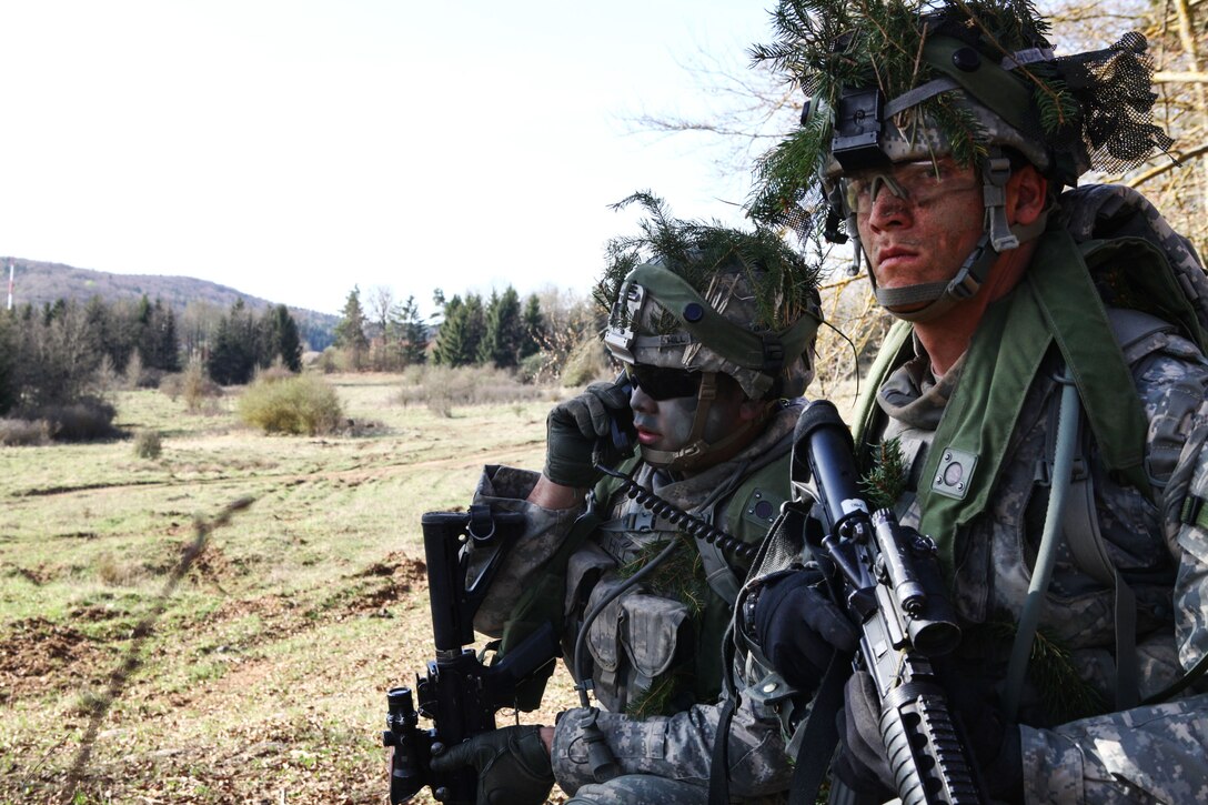 U.S. soldiers assigned to the Army's 2nd Cavalry Regiment, Palehorse Troop, 4th Squadron, transmit information while conducting reconnaissance during exercise Saber Junction 15 at the U.S. Army’s Joint Multinational Readiness Center in Hohenfels, Germany, April 16, 2015. Saber Junction is an annual exercise that promotes interoperability among NATO and partner nation participants.