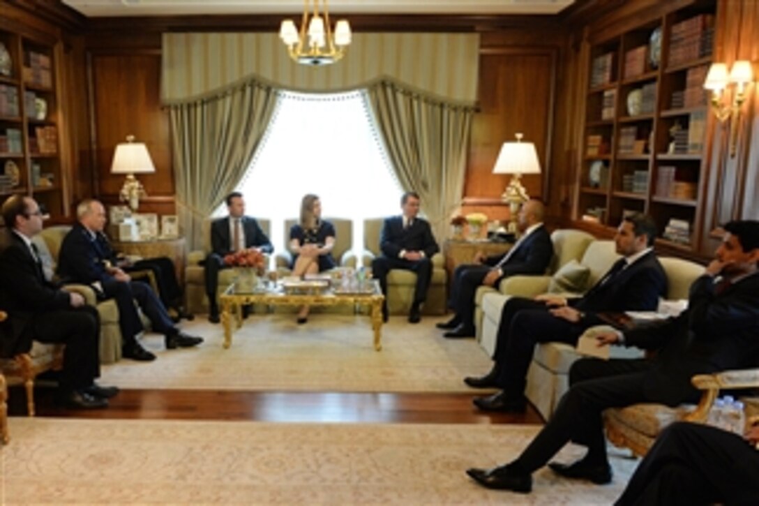 U.S. Defense Secretary Ash Carter, center right, talks with Yousef Al Otaiba, third from right, the Emirati ambassador to the United States, in Washington, D.C., April 20, 2015. Carter met with the ambassador and Crown Prince Mohammed Bin Zayed Al Nahyan of the United Arab Emirates to discuss the U.S.-UAE bilateral defense relationship and other issues.