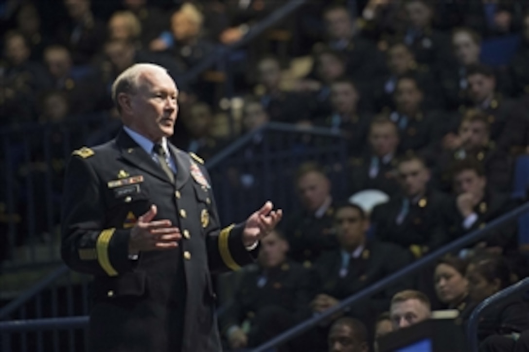 Army Gen. Martin E. Dempsey, chairman of the Joint Chiefs of Staff, addresses the graduating class of midshipmen at the U.S. Naval Academy in Annapolis, Md., April 21, 2015. Dempsey is on a two-day tour of the U.S. Naval Academy, U.S. Military Academy and Harvard University. 