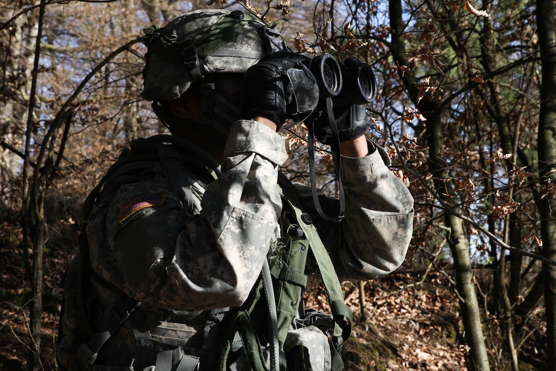 A U.S. soldier scans the area while conducting reconnaissance during exercise Saber Junction 15 at the U.S. Army’s Joint Multinational Readiness Center in Hohenfels, Germany, April 16, 2015. More than 4,700 troops from 17 countries participated in the exercise, including: Albania, Armenia, Belgium, Bosnia, Bulgaria, Great Britain, Hungary, Latvia, Lithuania, Luxembourg, Macedonia, Moldova, Poland, Romania, Sweden, Turkey and the U.S.