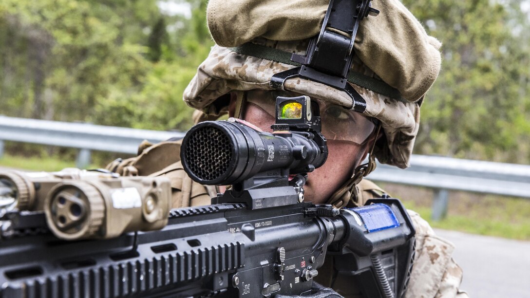 Private First Class Jesse Owings, a rifleman with 1st Battalion, 6th Marine Regiment, 2nd Marine Division and native of Middleburg, Florida, posts security during a patrol to identify improvised explosive devices aboard Marine Corps Base Camp Lejeune, North Carolina, April 15, 2015. The Marines received a couple days of classes about counter improvise explosive devices from contractor instructors that teaches tactics and techniques they can use to identify at the small unit level.  (U.S. Marine Corps photo by Lance Cpl. Immanuel Johnson/Released)