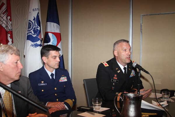 Colonel Paul Olsen, U.S. Army Corps of Engineers’ Norfolk District commander, provides opening remarks for the 2015 Mid-Atlantic Waterways Conference ongoing through April 23, at the Portsmouth-Norfolk Renaissance Waterfront Hotel in Portsmouth, Va. Joining him is Arthur W. Moye Jr., executive vice president, Virginia Maritime Association and Captain Christopher Keane, U.S. Coast Guard commander, Sector Hampton Roads.