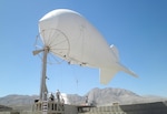 A new Persistent Surveillance System (PSS) begins its assent above Camp Julien Sept. 14, 2010, to provide the Afghan National Security Forces and International Security Assistance Force officials with an extra level of surveillance capability for security operations around Kabul, Afghanistan. The PSS, a floating aerostat (or blimp), has high-tech camera equipment able to provide 360 degree views of the city.