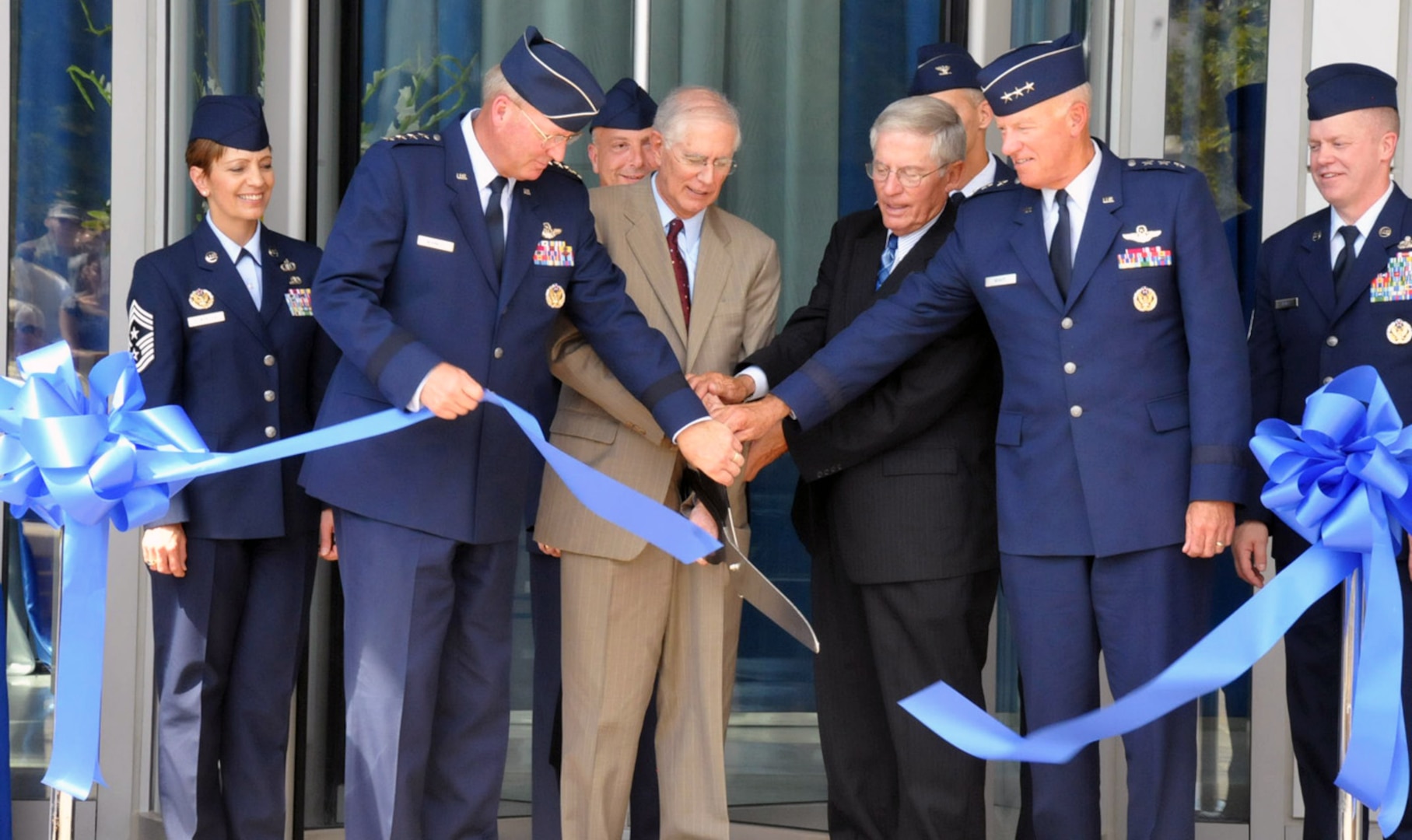 From left to right: Chief Master Sgt. Denise Jelinski-Hall, the National Guard Bureau senior enlisted advisor; Gen. Craig R. McKinley, the chief of the NGB; retired Maj. Gen. Donald W. Sheppard, former director of the ANG; retired Lt. Gen. John Conaway, former chief of the NGB; Lt. Gen. Harry M. Wyatt III, director of the ANG; and Command Chief Master Sgt. Christopher Muncy, the ANG command chief, cut a ceremonial ribbon on the new addition to the ANG Readiness Center named “Shepperd Hall.”
