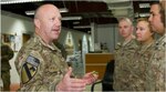 Command Sgt. Maj. Brunk Conley, top enlisted Soldier in the National Guard, speaks with a group of National Guardsmen during a senior leader visit to Camp Arifjan, Kuwait, April 6, 2015. He provided career guidance and addressed the questions and concerns of the Soldiers. 
